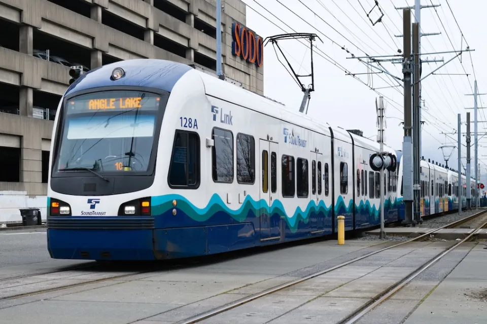 Bllue and white Link light rail train in Tukwila, Washington.